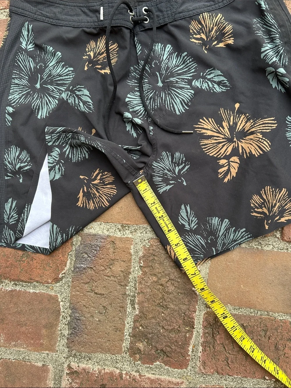Vuori Black Swim Shorts with Teal & Tan Floral Print